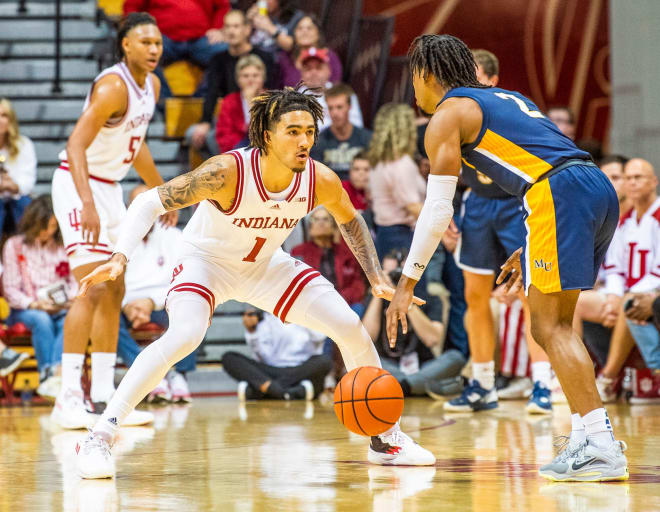 Caption: Indiana's Jalen Hood-Schifino (1) plays defense during the first half of the Indiana versus Marian men's basketball game at Simon Skjodt Assembly Hall on Saturday, Oct. 29, 2022.