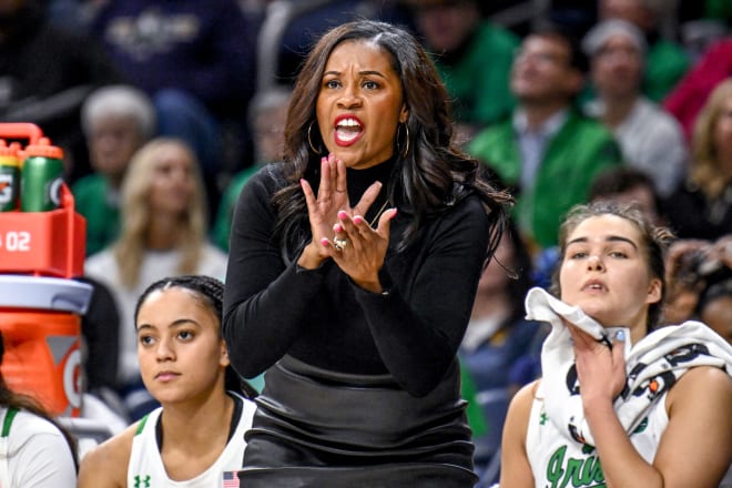 Notre Dame women's head basketball coach Niele Ivey (center) remains on a knowledge quest as she enters season four of her regime. 