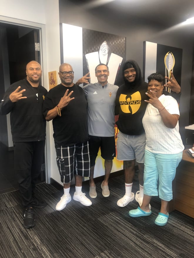 From L-R: ASU LB's coach Antonio Pierce, Ban's father, ASU head coach Herm Edwards, Jordan Banks and his mother (Jordan Banks Twitter Photo)