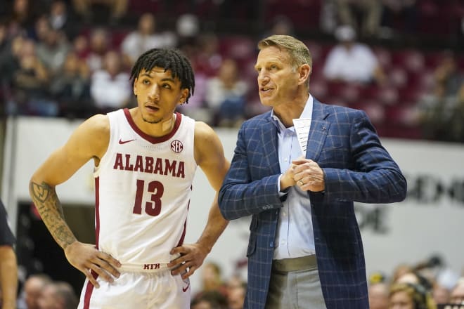 Alabama Crimson Tide head coach Nate Oats talks to Alabama Crimson Tide guard Jahvon Quinerly (13) during the first half at Coleman Coliseum. Photo | Marvin Gentry-USA TODAY