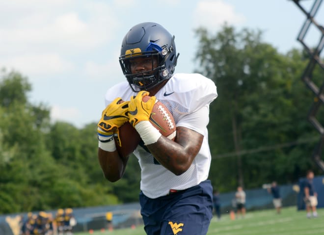 Brown is one of several competing for time in the West Virginia backfield. 