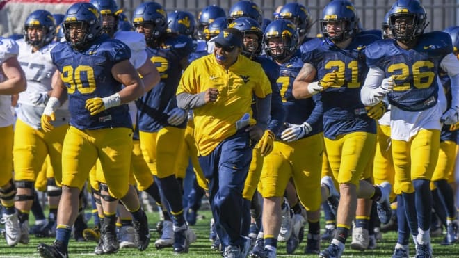 The West Virginia Mountaineers football coaching staff was forced to adjust in 2021.