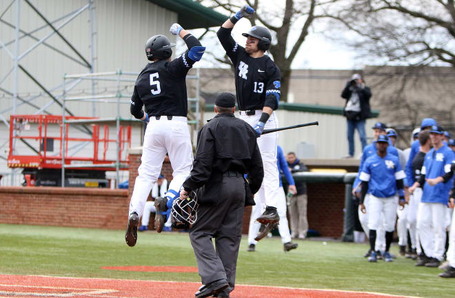Kentucky's T.J. Collett (5) received a celebratory forearm bash from Kole Cottam after hitting his fourth home run of a weekend series against Oakland.