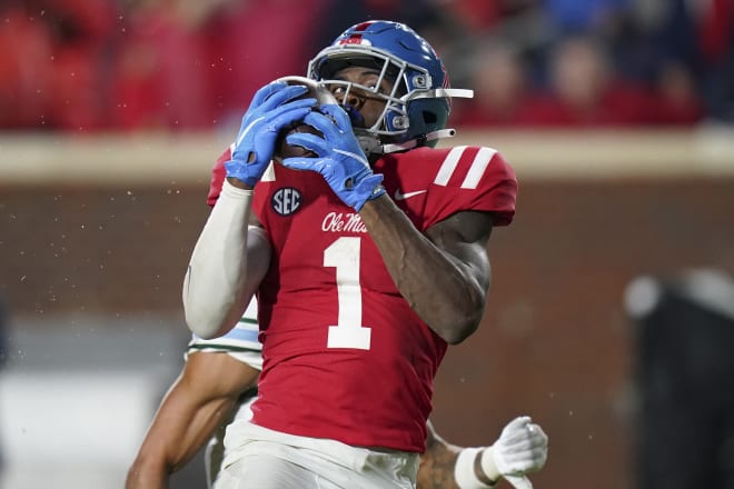 Ole Miss Rebels wide receiver Jonathan Mingo (1) catches a touchdown pass against Tulane Green Wave at Vaught-Hemingway Stadium. Mandatory Credit: Marvin Gentry-USA TODAY Sports