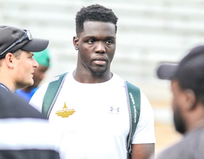 Kwity Paye knew as soon as Michigan offered that they'd be hard to turn down.