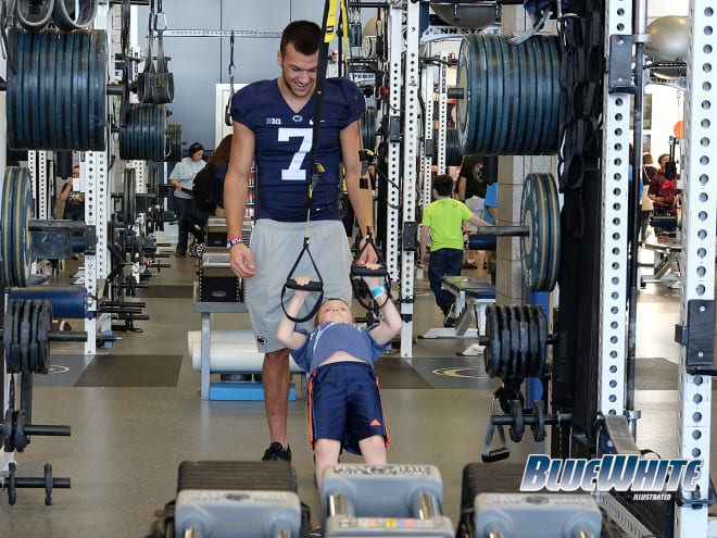 QB Jake Zembiec supervises in the weight room.