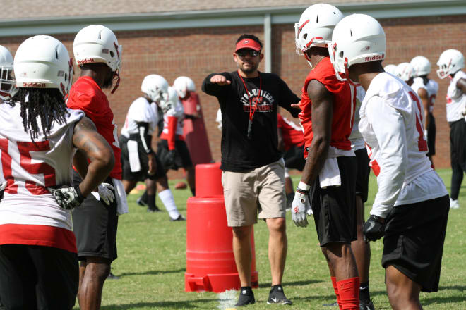 Safeties coach Jami DeBerry instructing players during fall camp