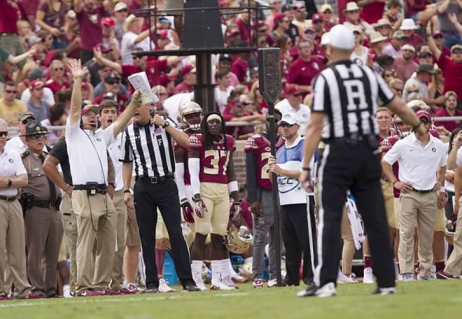 Florida State coach Jimbo Fisher protests a targeting call in is team's loss against North Carolina State.