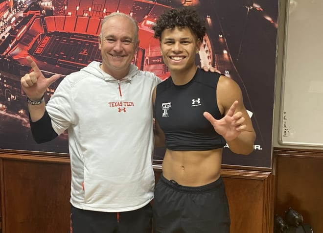 Aiden Meeks with Texas Tech head coach Joey McGuire