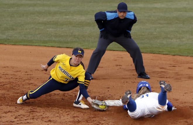 Kentucky's Erin Coffel was called out attempting to steal second during Thursday's game against Michigan, but she appeared to beat the tag.