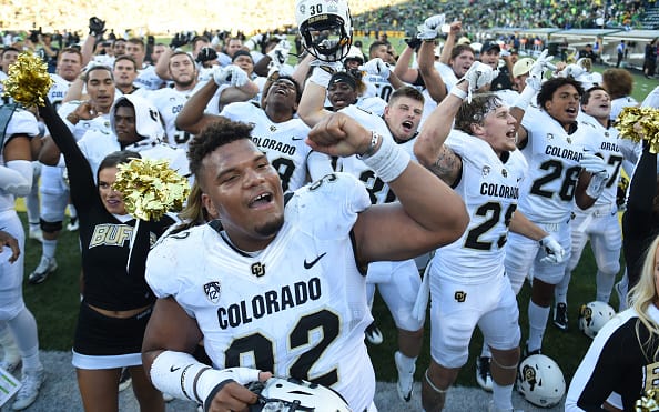 EUGENE, OR - SEPTEMBER 24: Defensive end Jordan Carrell #92 of the Colorado Buffaloes celebrates with his teammates after the game against the Oregon Ducks at Autzen Stadium on September 24, 2016 in Eugene, Oregon. Colorado won the game 41-38. (Photo by Steve Dykes/Getty Images)