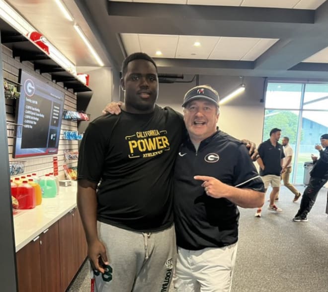 Rivals250 offensive lineman Dontrell Glover and Kirby Smart. Photo via Glover's Twitter.