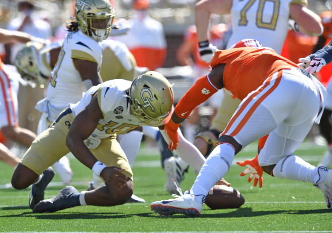 Jeff Sims fumbles a bad snap against Clemson