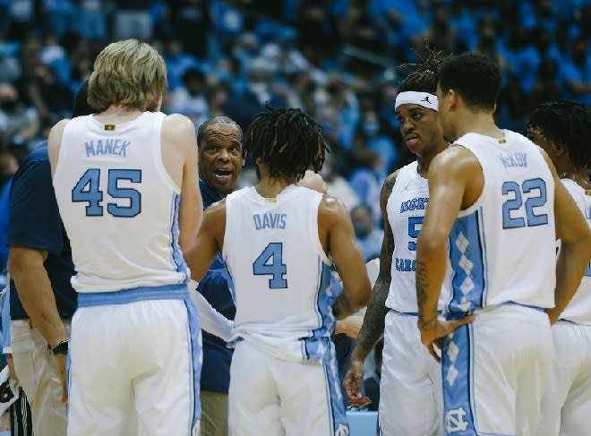 Hubert Davis learned plenty from Dean Smith, certainly about calming a team late in close games.