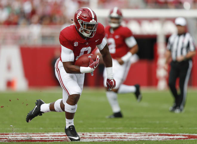 Alabama running back Josh Jacobs is looking to build a future for him and his son Braxton at Alabama. Photo | Alabama Athletics 
