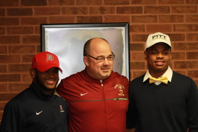 Ford with teammate Dewayne Murray and Steel Valley head coach Rod Steele