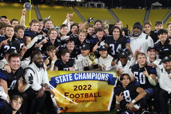 ALA-Gilbert North players gather together at Sun Devil Stadium shortly after defeating Snowflake to win the 4A championship earlier this month.  