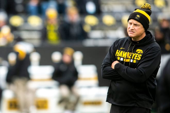 Iowa offensive coordinator Brian Ferentz watches players warm up before a NCAA Big Ten Conference football game against Minnesota. © Joseph Cress/Iowa City Press-Citizen / USA TODAY NETWORK