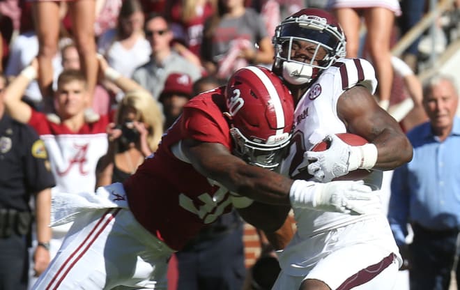 Alabama linebacker Mack Wilson (30) tackles Texas A&M wide receiver Speedy Noil (2) during the first half of a game against the Texas A&M Aggies at Bryant-Denny Stadium in Tuscaloosa on Saturday, Oct. 22, 2016.