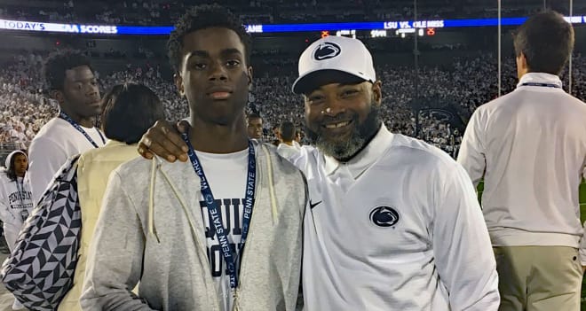 Bell poses with DB coach Terry Smith before Saturday night's game.
