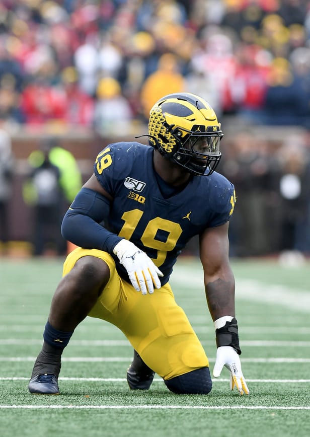 Michigan Wolverines football senior defensive end Kwity Paye is among those leading voluntary workouts this week.