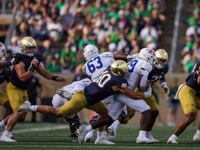 Notre Dame defensive end Joshua Burnham (40) makes a tackle against Tennessee State last season.