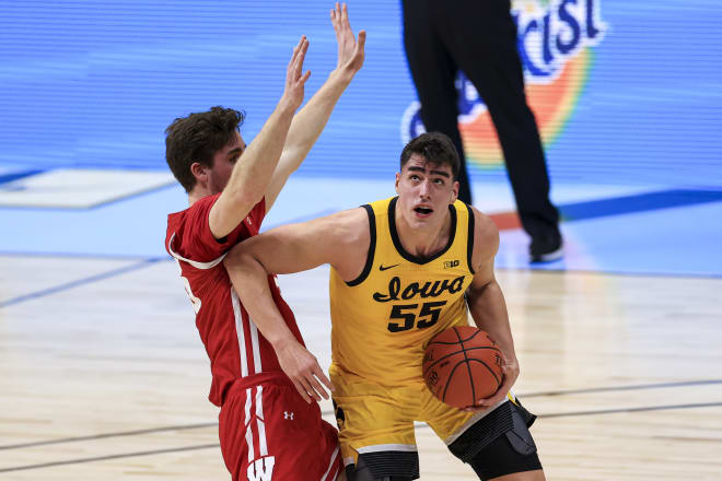 Iowa center Luka Garza is among the four finalists for the prestigious Naismith Trophy.