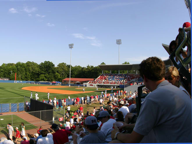 Fans, in 2006, sitting on the hill down the left field line prior to the expansion. 