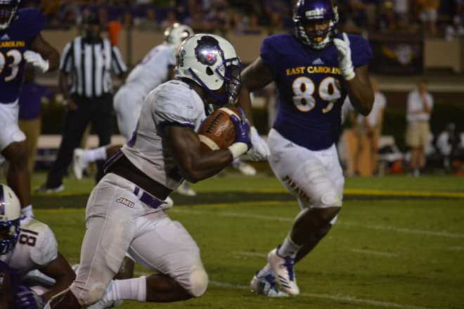 Cardon Johnson scampers for an 85-yard touchdown in James Madison's 34-14 win over ECU.