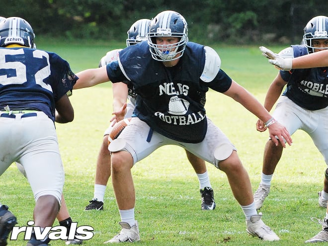 New England offensive lineman Drew Kendall holds a Michigan offer. 