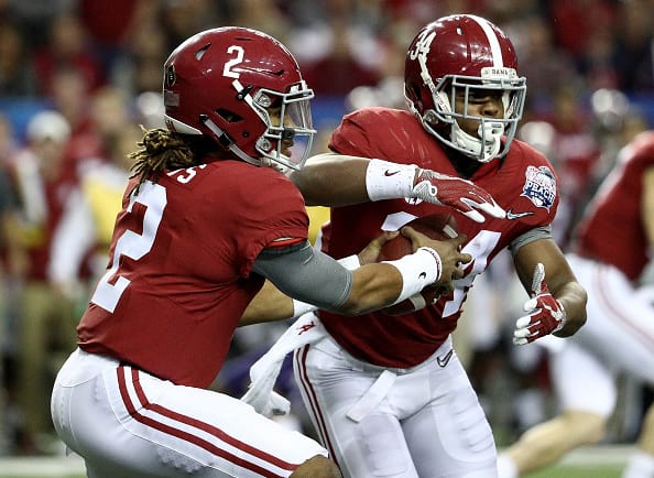 ATLANTA, GA - DECEMBER 31: Jalen Hurts #2 of the Alabama Crimson Tide hands the ball off to Damien Harris #34 of the Alabama Crimson Tide during the 2016 Chick-fil-A Peach Bowl at the Georgia Dome on December 31, 2016 in Atlanta, Georgia. (Photo by Maddie Meyer/Getty Images)