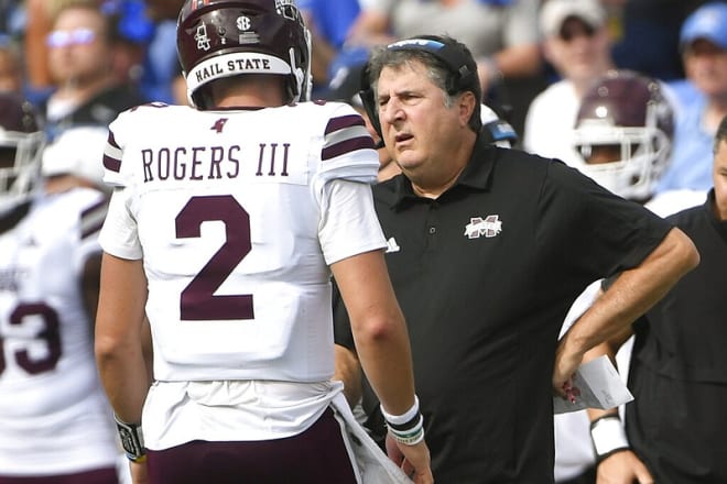 Mississippi State coach Mike Leach, right, talks to Mississippi State quarterback Will Rogers during the first half of an NCAA college football game against Memphis, Saturday, Sept. 18, 2021, in Memphis, Tenn.