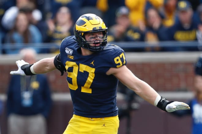 Michigan Wolverines football junior defensive end Aidan Hutchinson was a third-team All-Big Ten honoree in 2019 before being hurt for much of the season in 2020.