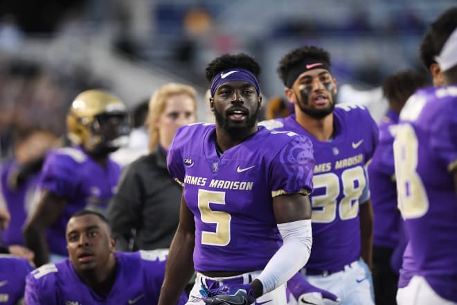 James Madison senior safety Raven Greene (5) looks on during the Dukes' 21-0 win over New Hampshire this past Saturday in Harrisonburg.