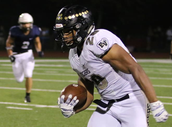 Blue Valley RB William Evans has played a key role in the Tigers punishing ground game.