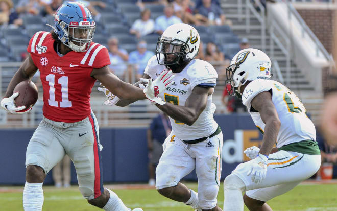 Ole Miss Rebels wide receiver Dontario Drummond (11) carries the ball against Southeastern Louisiana Lions defensive back Xavier Lewis (7) during the second half of a 2019 game at Vaught-Hemingway Stadium.