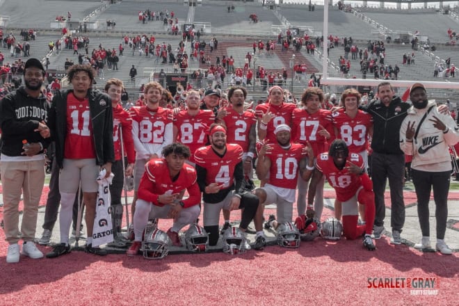 Brian Hartline poses with current and former Ohio State wide receivers after the spring game. 