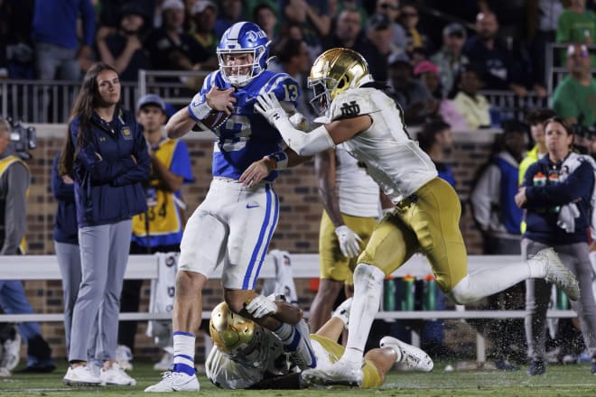 Former Duke quarterback Riley Leonard (13) signed Wednesday to join forces with the team he opposed on Sept. 30, Notre Dame.