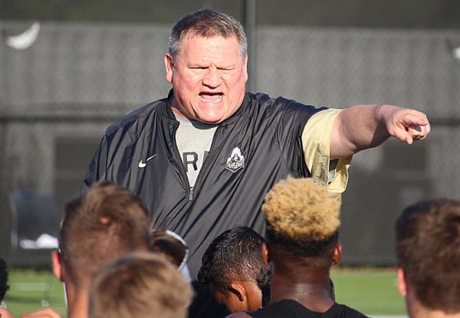 Don Dunn adresses participants at one of Purdue's prospect camps in June.