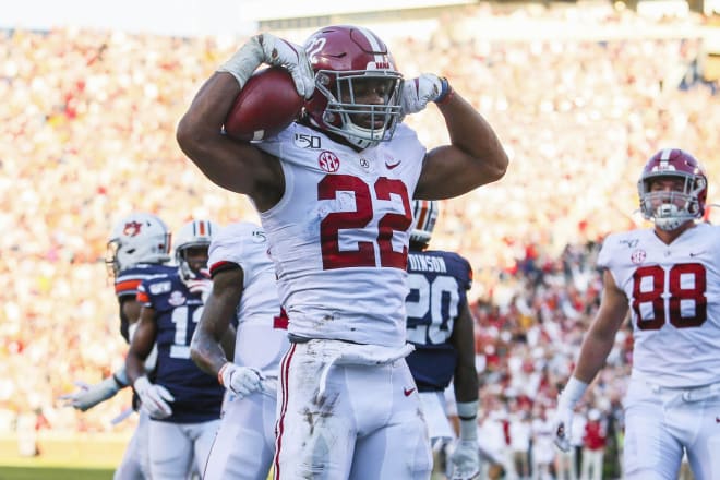 Alabama Crimson Tide running back Najee Harris (22) reacts after scoring a touchdown during the second quarter against the Auburn Tigers at Jordan-Hare Stadium. Photo | Imagn