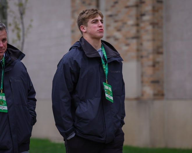 Bodie Kahoun, right, with his father on their way to Notre Dame Stadium last Saturday for the Blue-Gold Game. Kahoun left his visit impressed and plans to return for an official visit in June. 