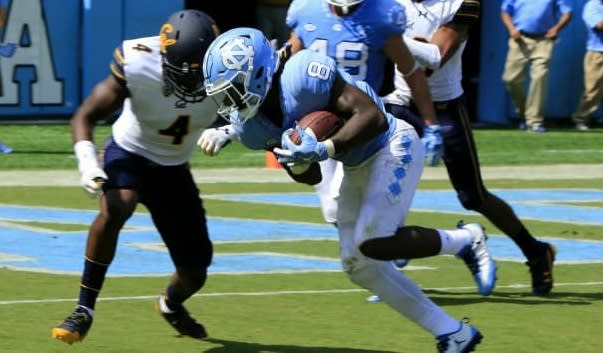 Carter scored two TDs in his UNC debut versus Cal in 2017.