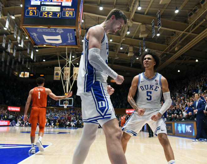 Duke's Kyle Filipowski, left, and Tyrese Proctor celebrate near the end of Saturday's win over Clemson. 