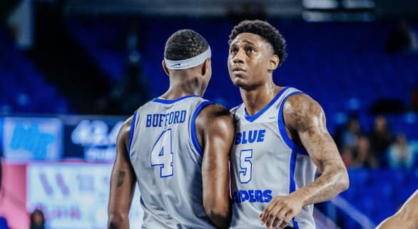 Teammates Eli Lawrence and Justin Bufford zone-in through the midst of their upset against #25 FAU (Photo credit: MT Athletics)