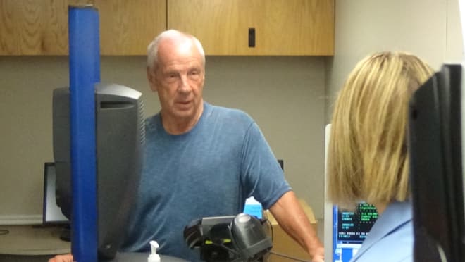 Roy Williams while getting his new REAL ID on Tuesday morning.