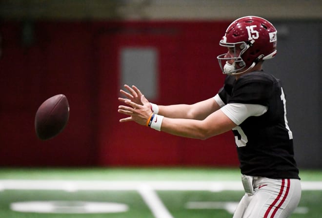 Alabama quarterback Ty Simpson (15) takes a snap during practice in the Hank Crisp Indoor Practice Facility at the University of Alabama. | Photo: Gary Cosby Jr.-Tuscaloosa News
