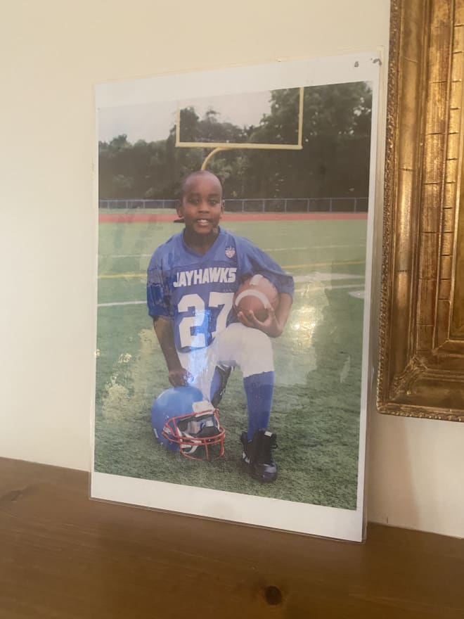 A seven-year old Darius Robinson poses for a picture.