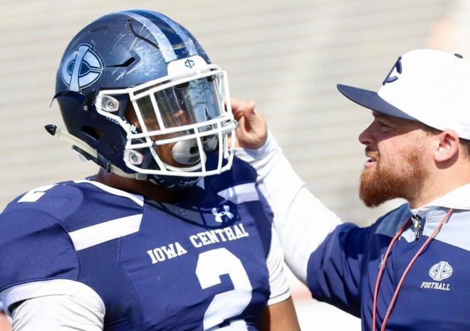 Marquis Burks (2, left) is coached up by Turrell Foster (right) during an Iowa Central Community College game.