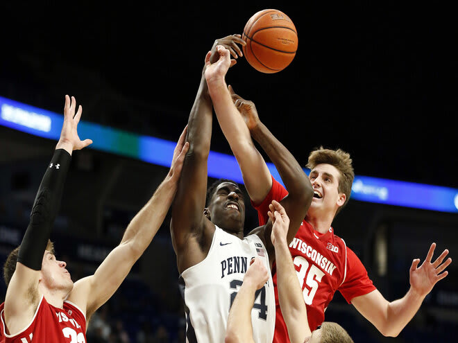 Wisconsin's Nate Reuvers (35) fights for a rebound against Penn State's Mike Watkins (24) on Jan. 6, 2019. Wisconsin won 71-52.