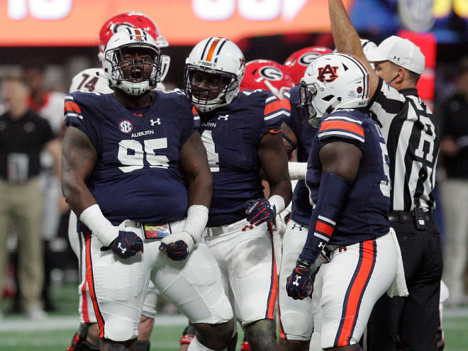 Russell celebrates an early stop in the SEC Championship game.